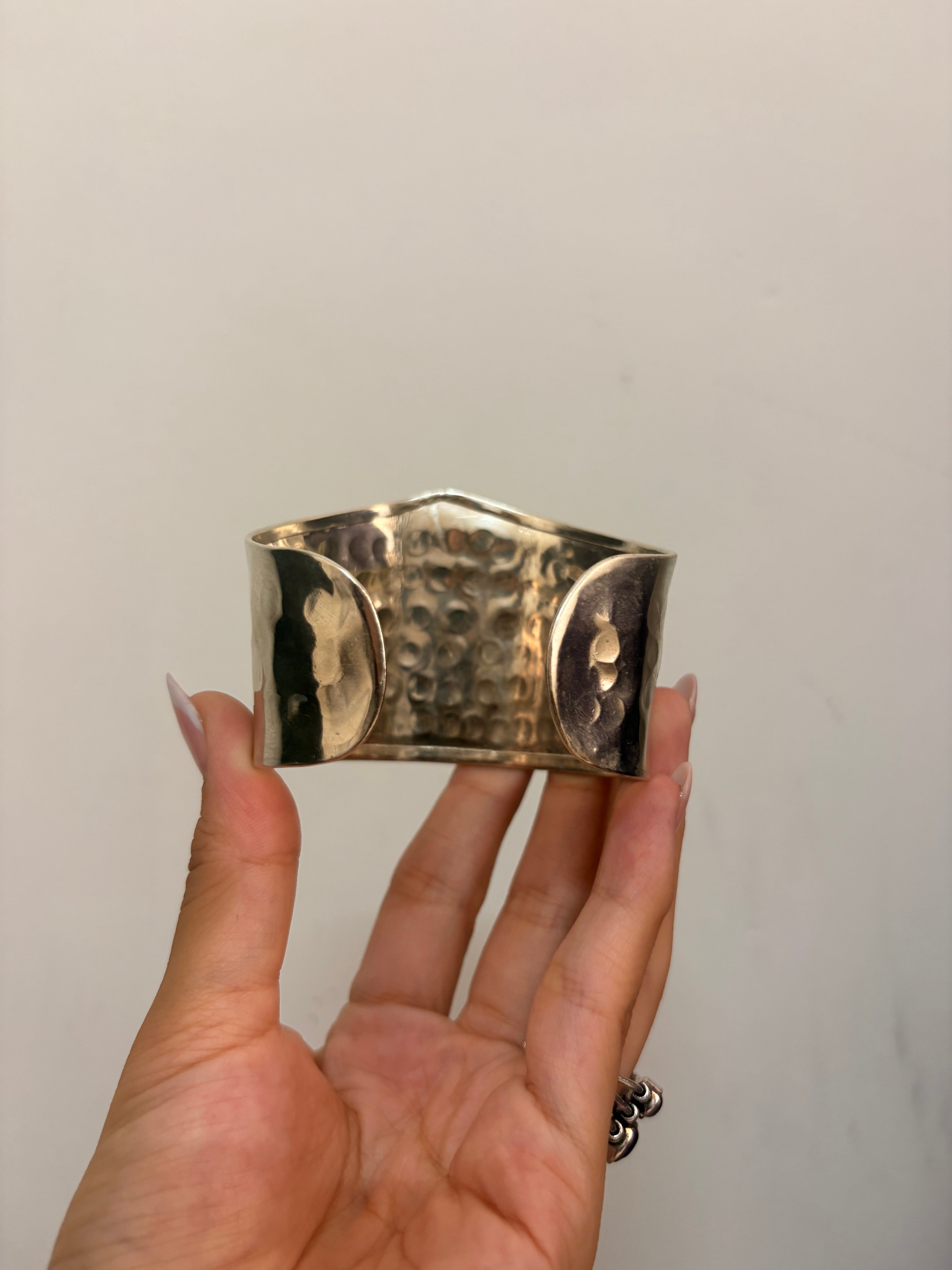 Handcuff with stones