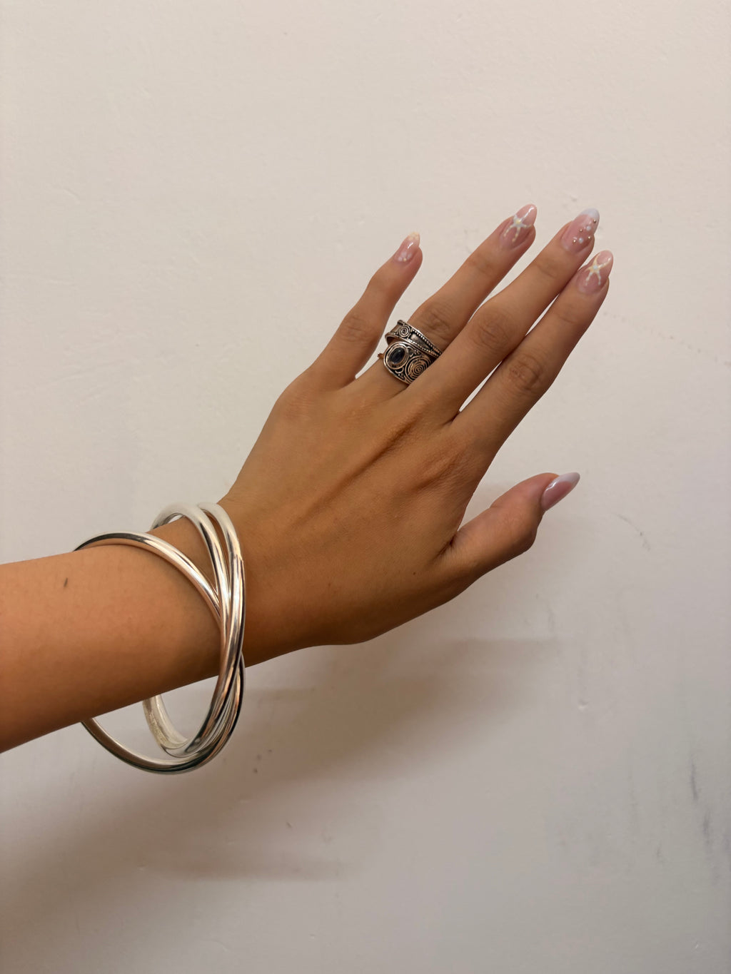 Intertwined bangles