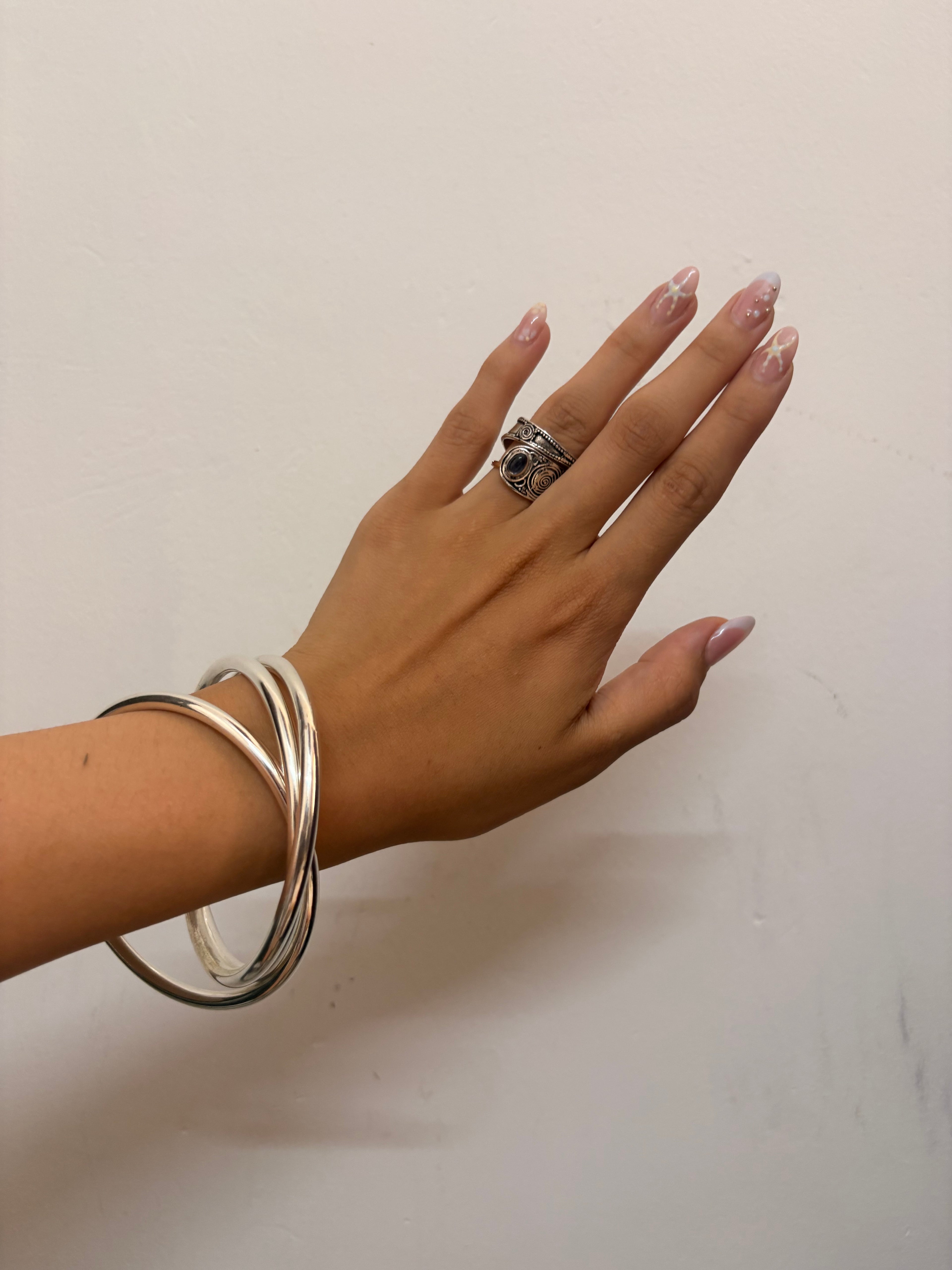 Intertwined bangles