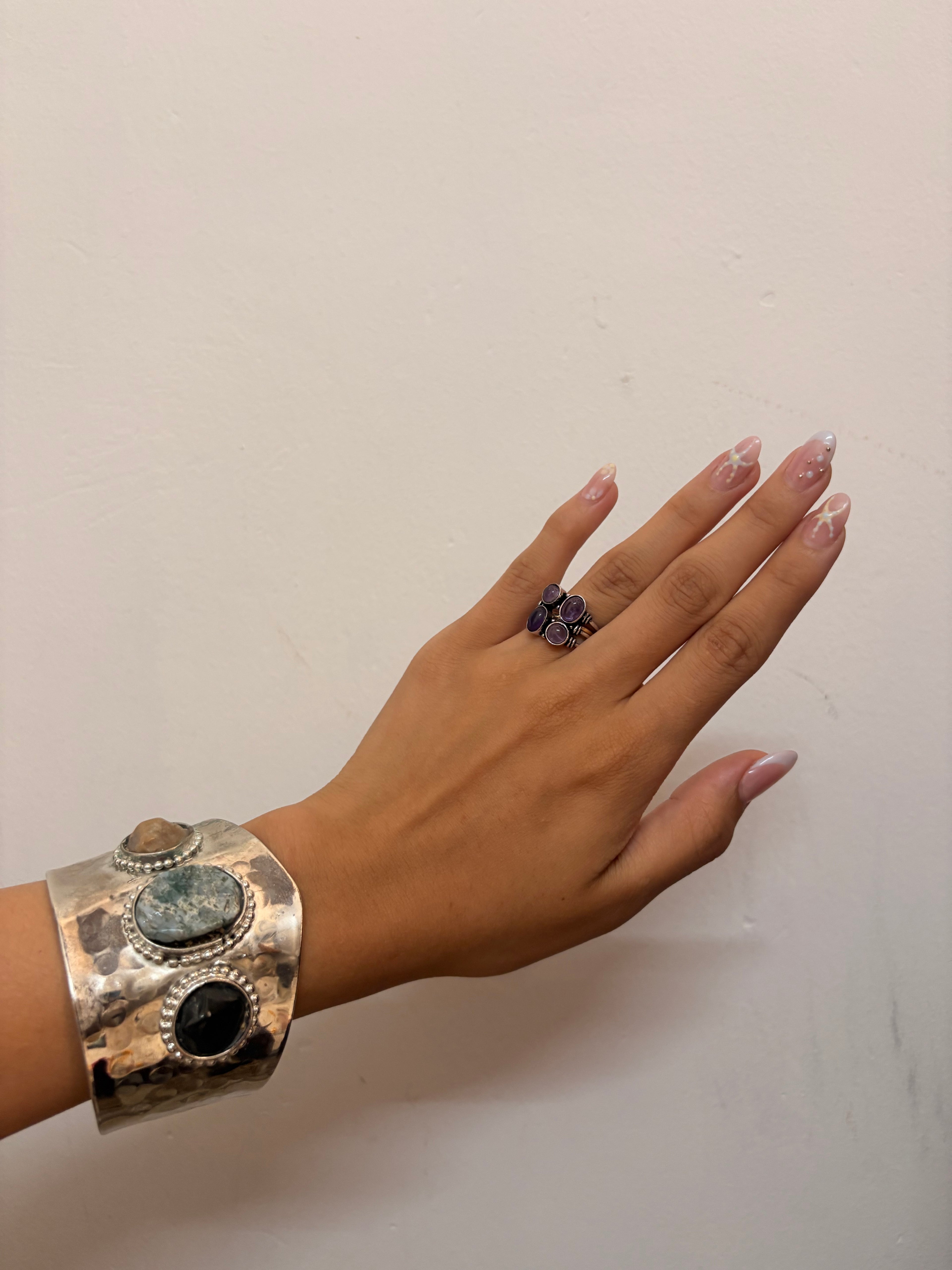 Handcuff with stones
