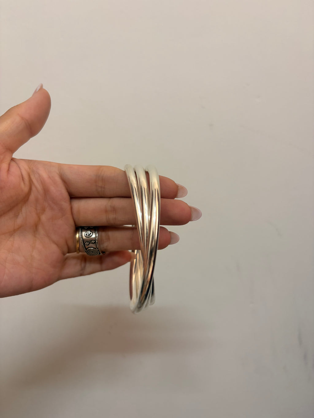 Intertwined bangles