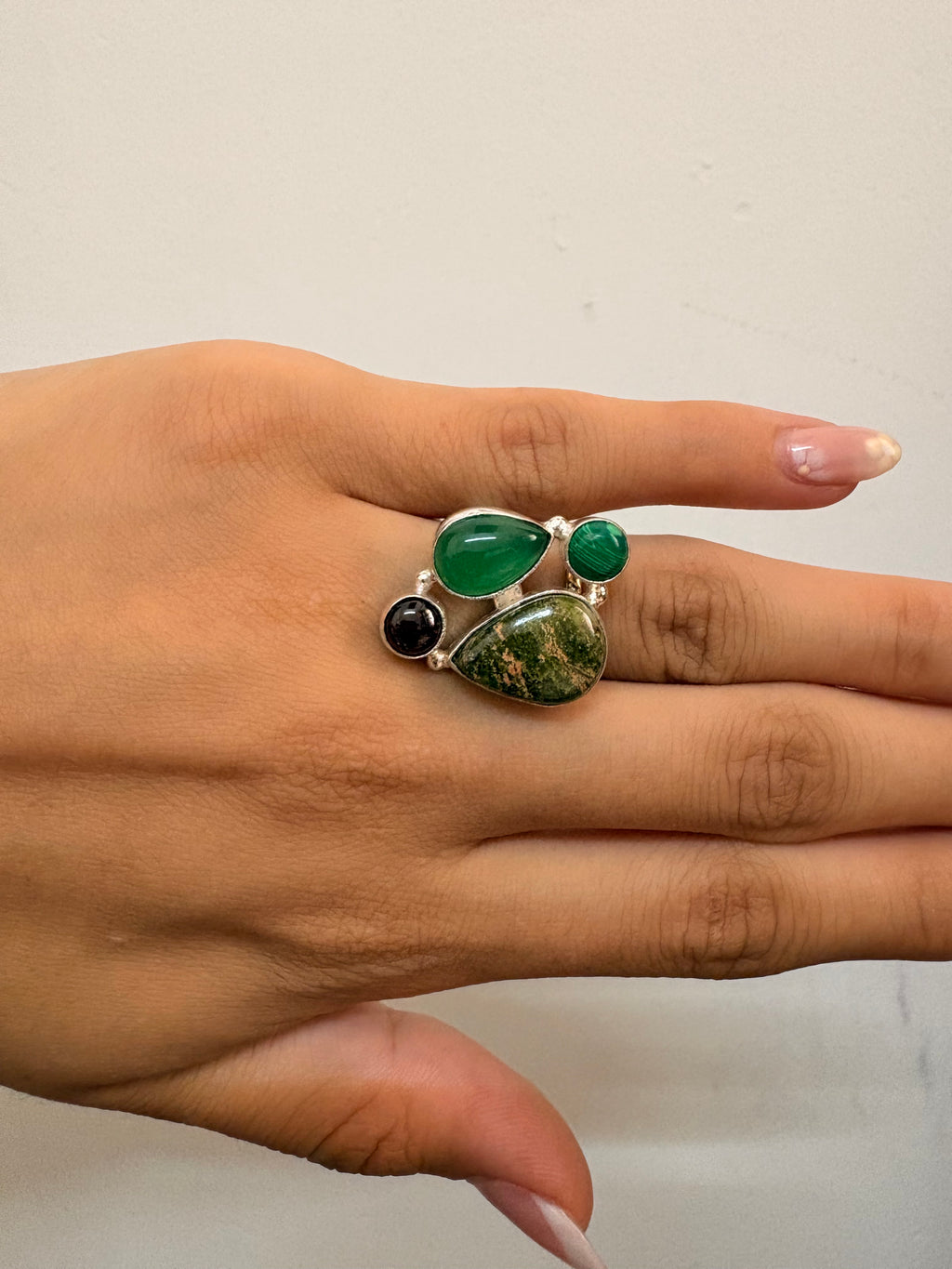Green stone rings
