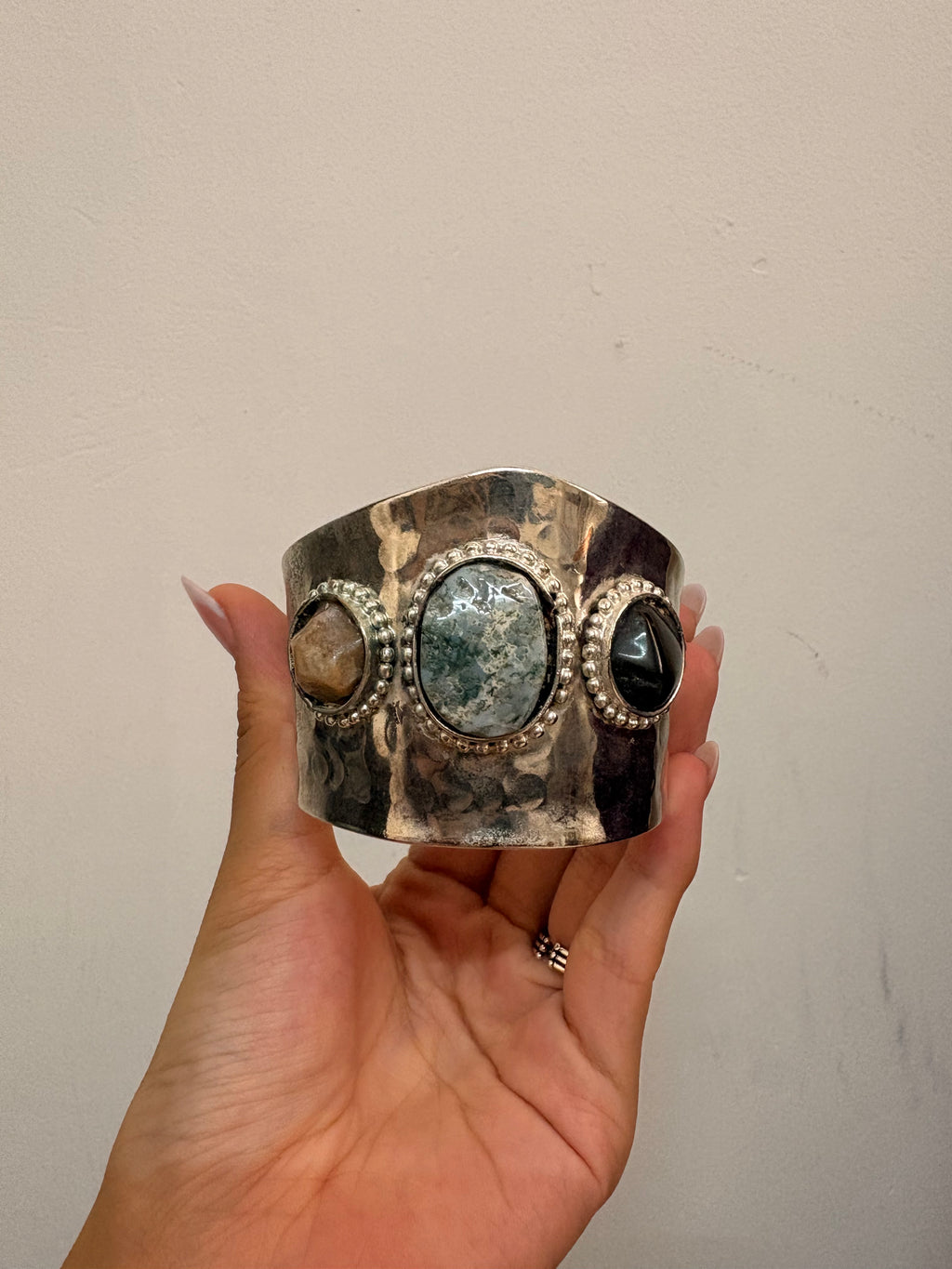 Handcuff with stones