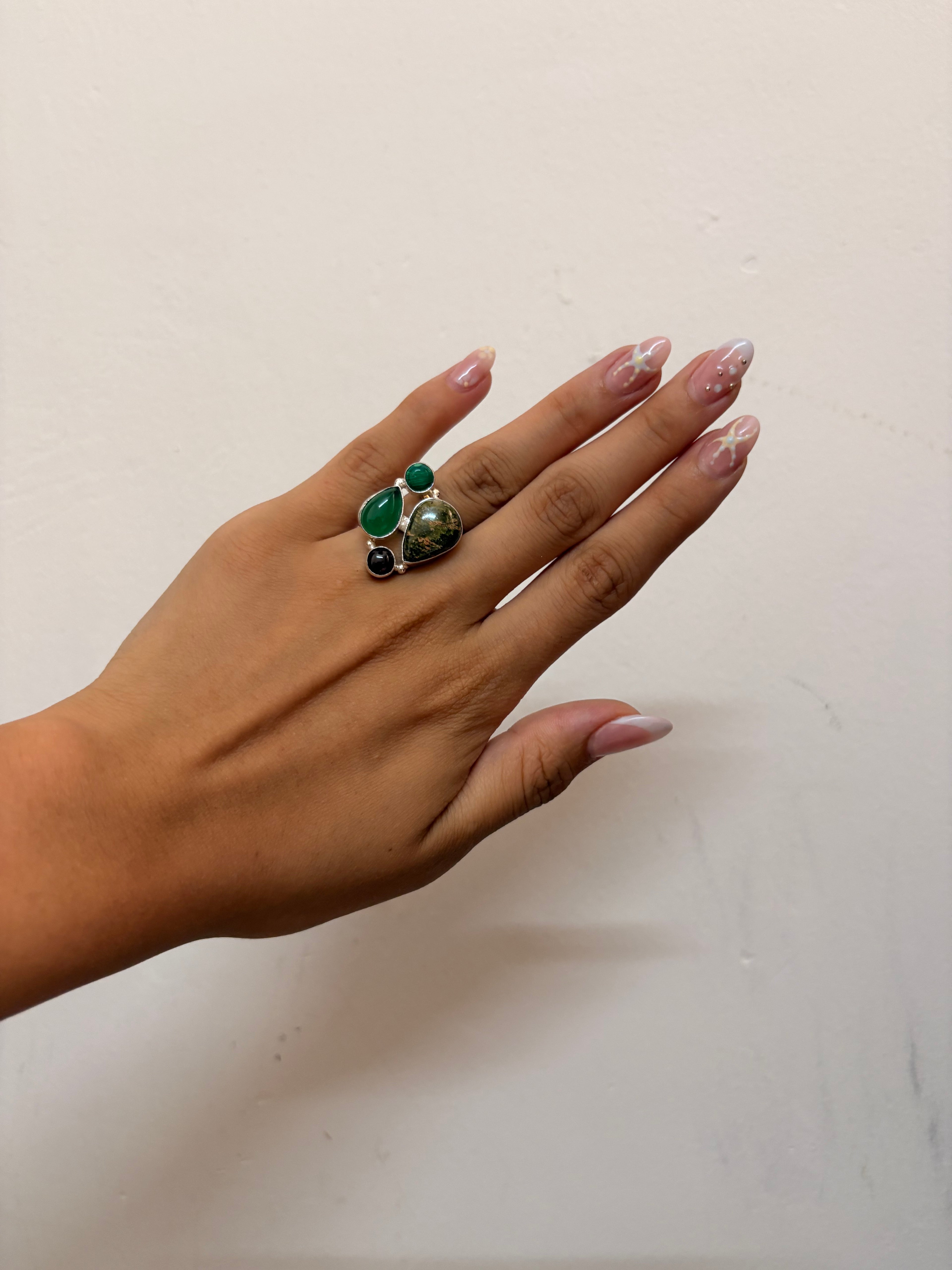 Green stone rings