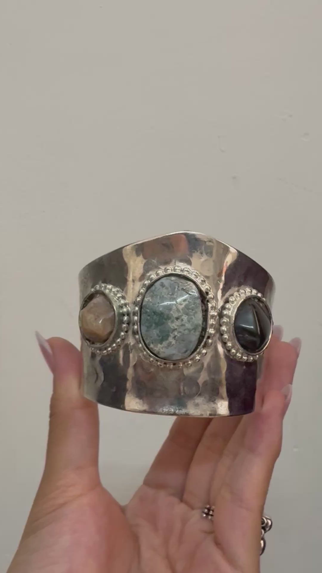 Handcuff with stones
